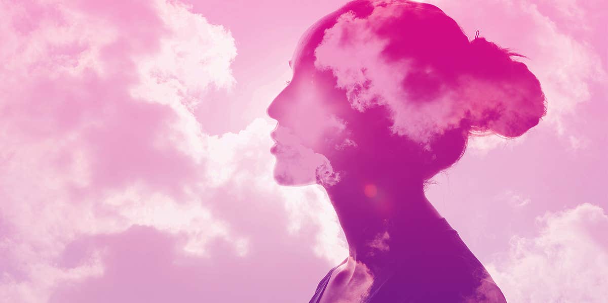 woman's head in the cloud thinking psychologically