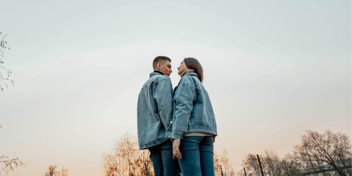 couple in matching jean jackets
