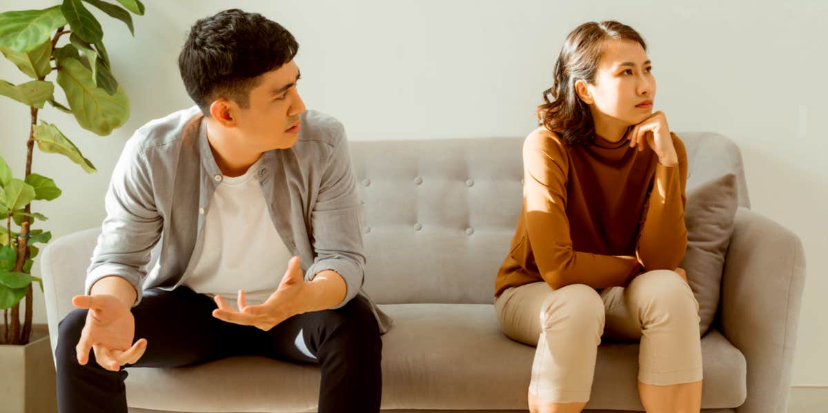 4 Less Obvious Signs Of Gaslighting That Most People Miss couple arguing on couch