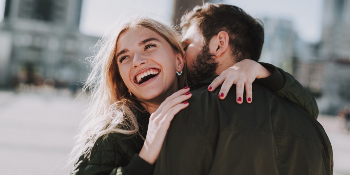 4 Signs You've Found Your Forever Person (Congrats!) man kissing woman