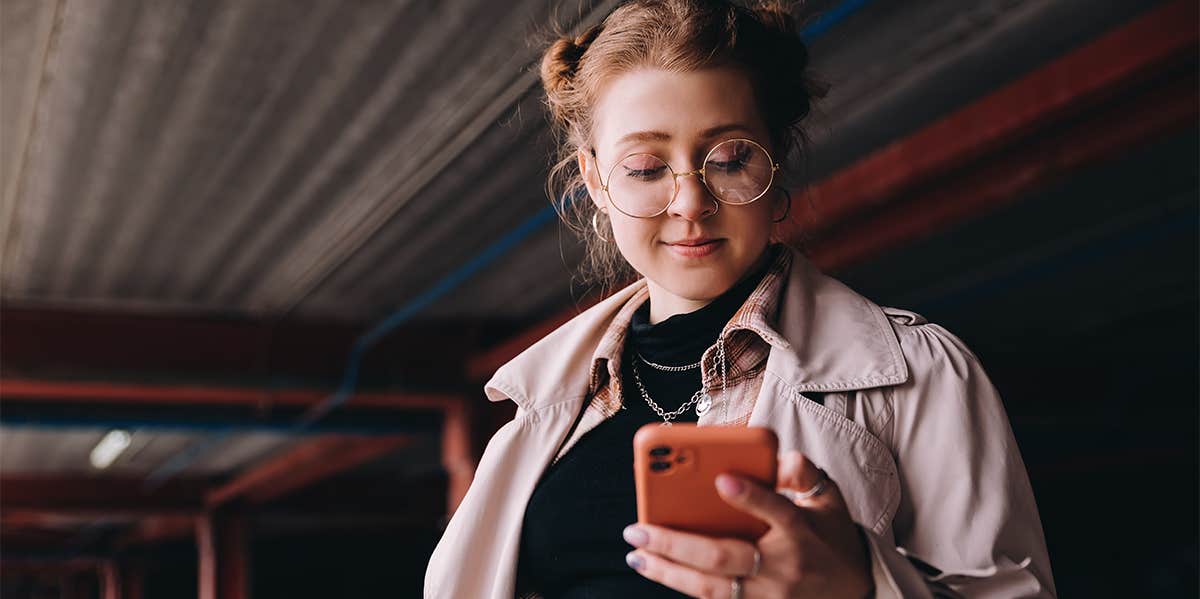 woman texting on phone