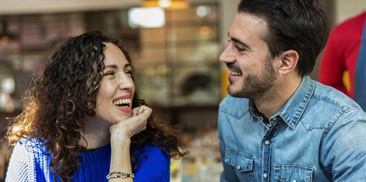 man and woman talking