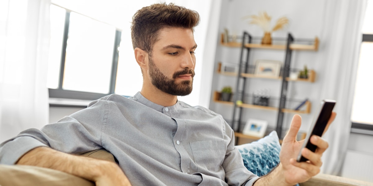The 4 Types Of Male Texters Who Will Break Your Heart man texting on phone