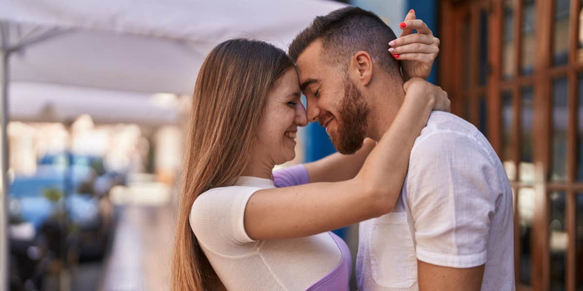 4 Ways To Think And Act Like A Mistress (When You're The Wife) couple touching foreheads