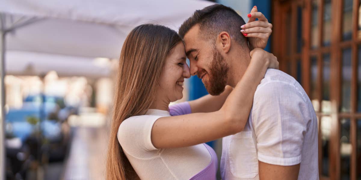 couple touching foreheads 