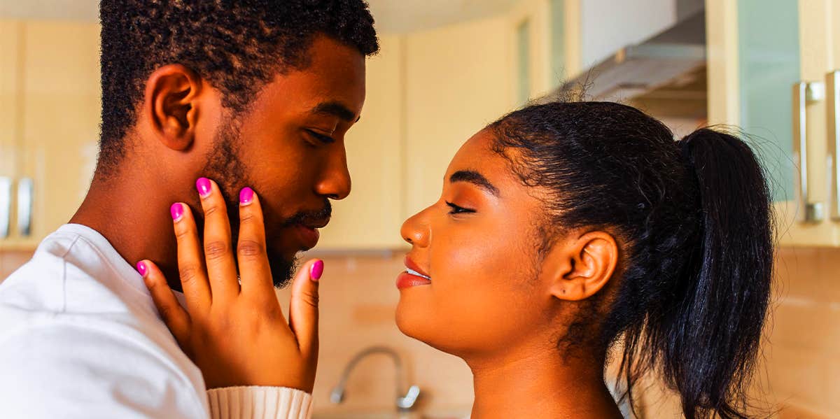 Signs You're Dating A 'Man-Boy,' Not A Man woman holding man close