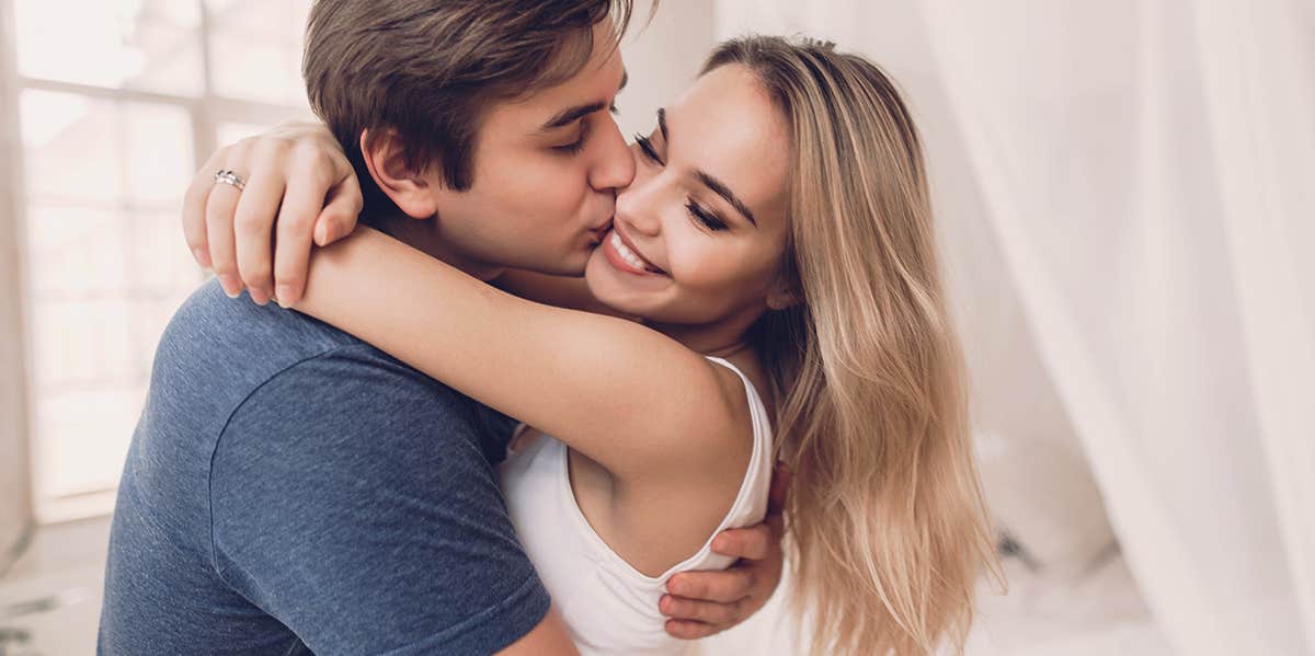 4 Ways To Keep Your Relationship Spicy (And NEVER Boring!) couple kissing