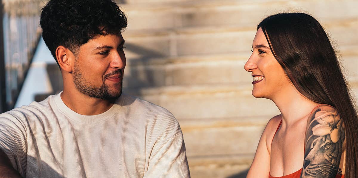 5 BIG BENEFITS when you Shift from Angry Lovers to Loving Friends guy and girl chatting on stairs