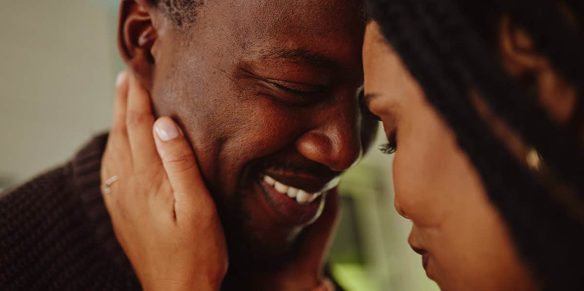 man and woman embracing