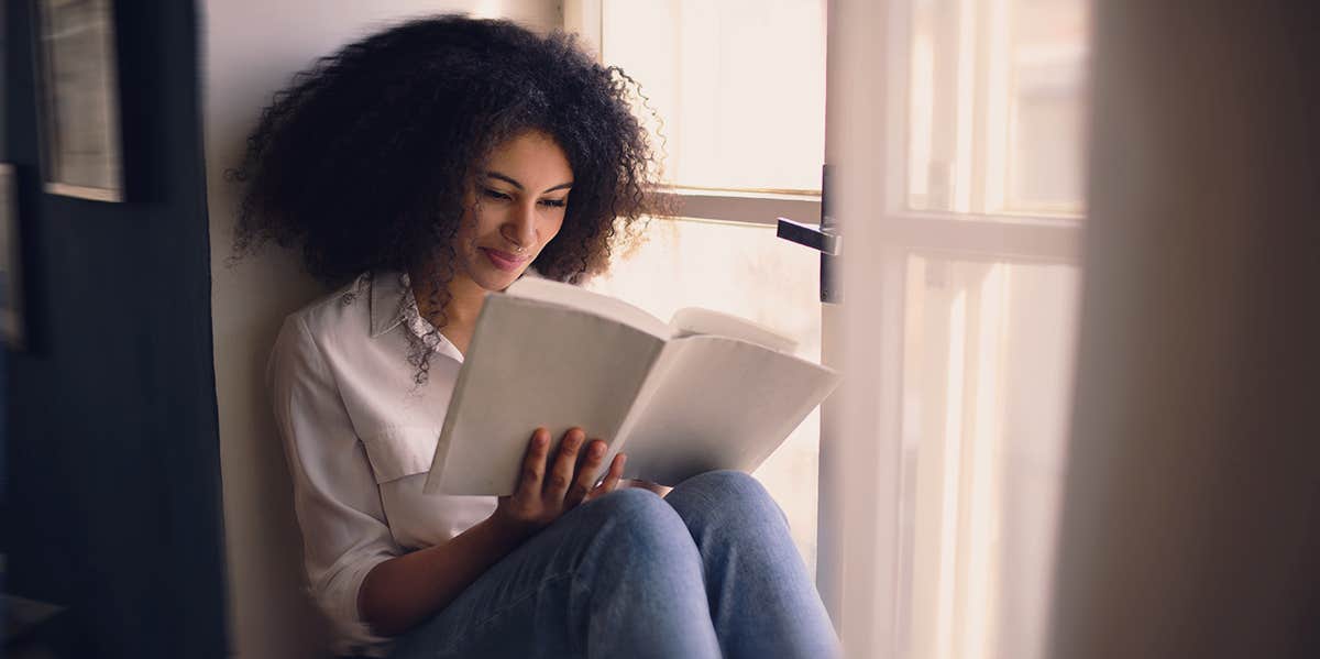 woman reading book