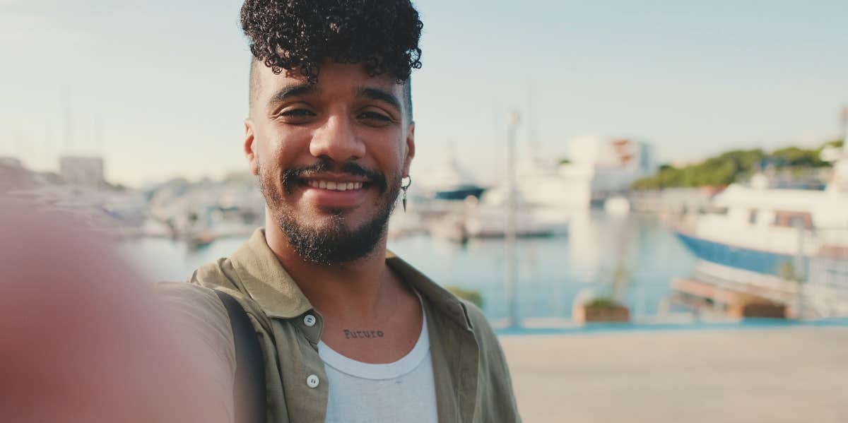 Guys Reveal The Harsh Reason They Didn't Call You Back man taking selfie