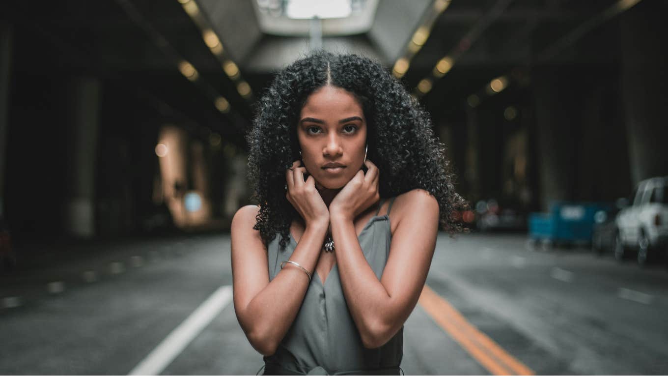 woman standing in street 