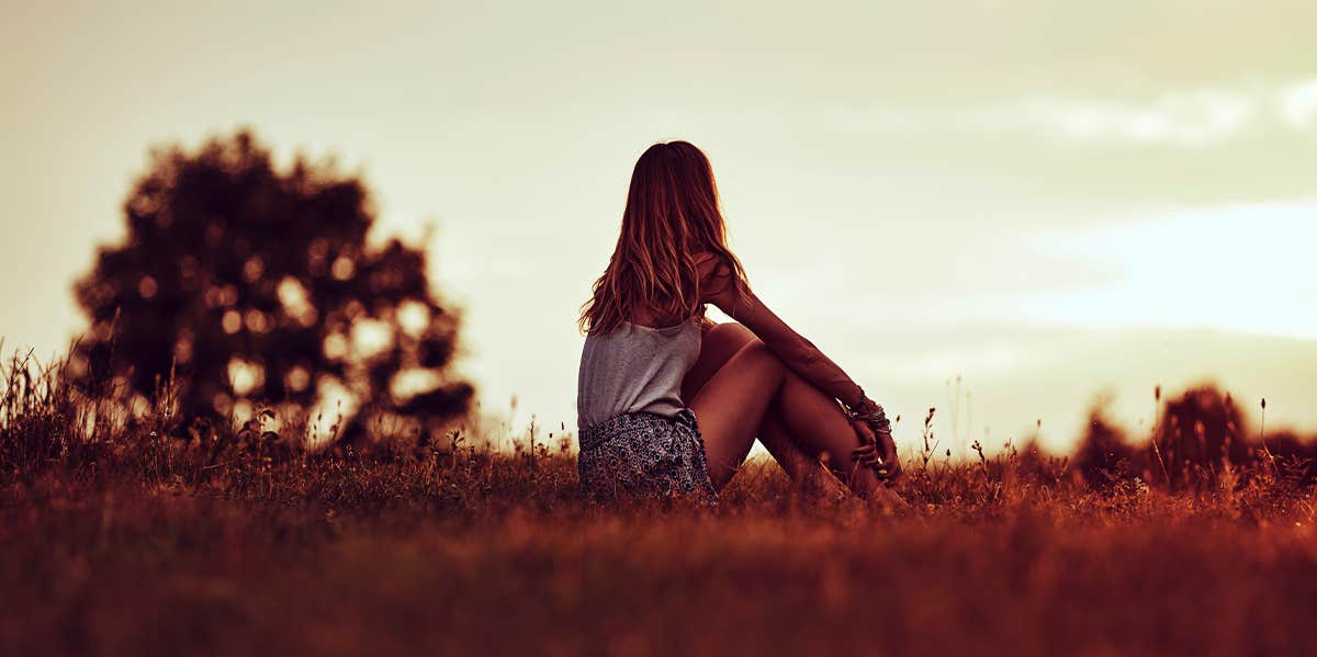 woman sitting alone