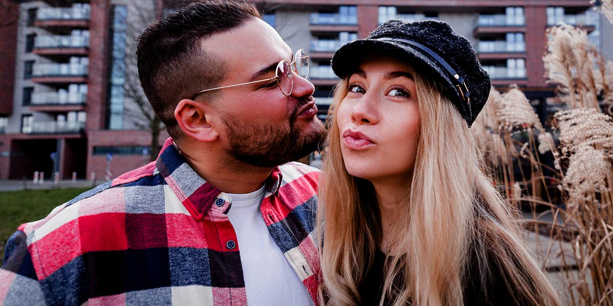 Types Of Women Men Avoid At All Costs woman making fuck face taking selfie with boyfriend