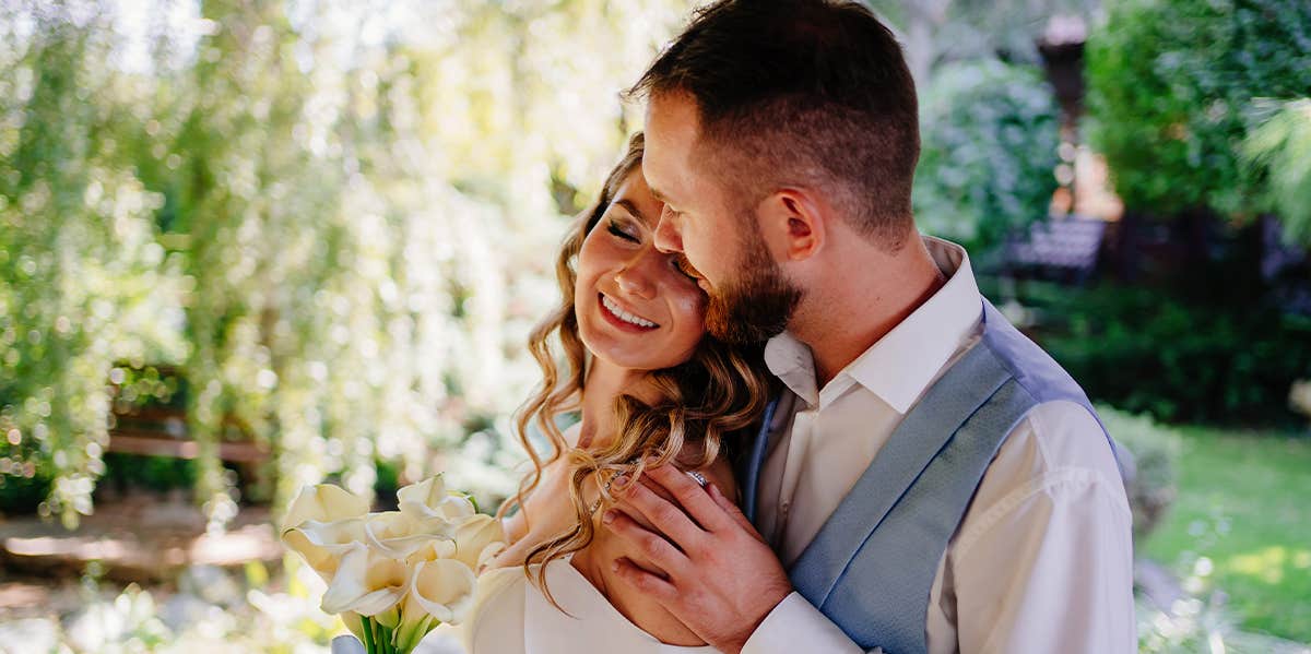 happy married couple embracing