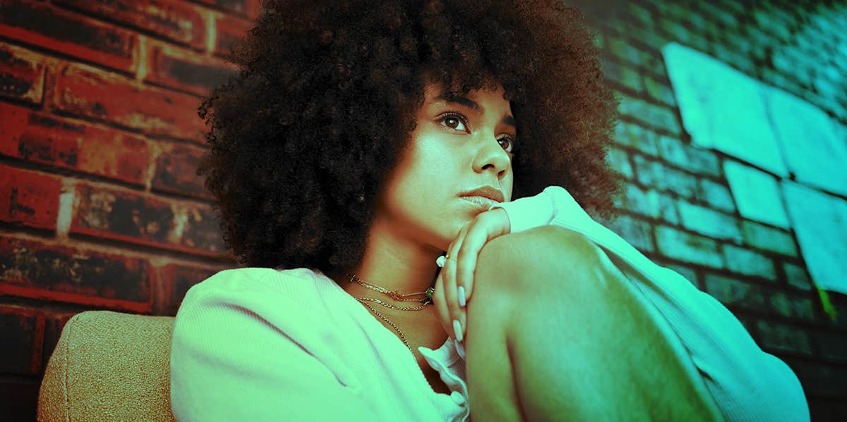 depressed woman sitting alone