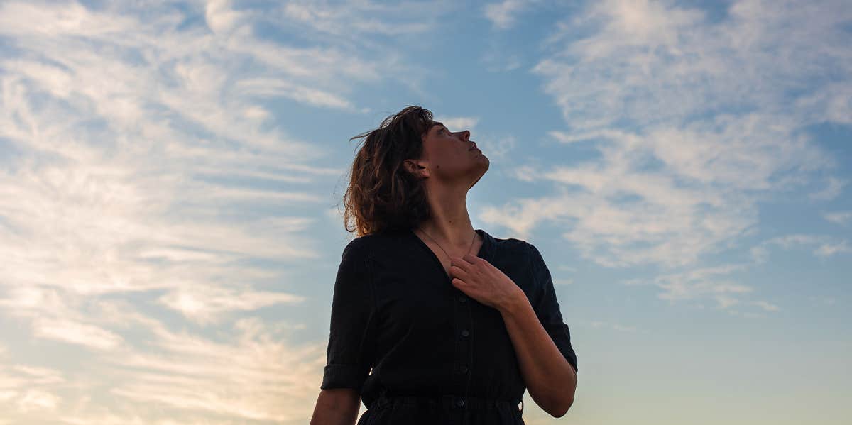 woman looking at the sky