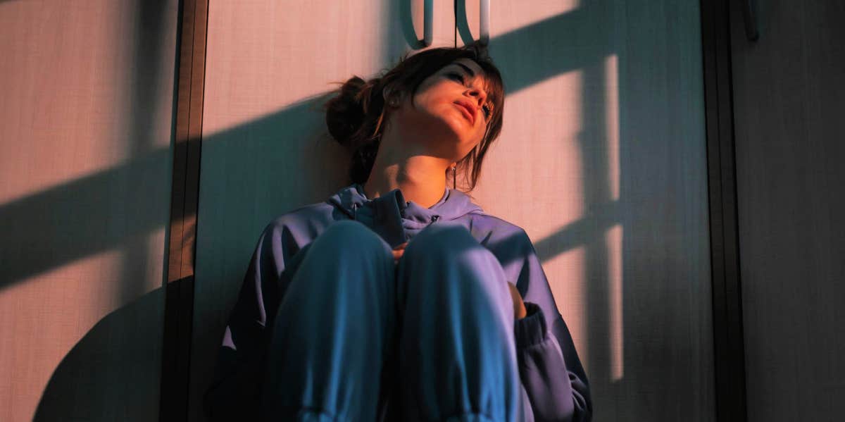 5 Ways You Destroy Your Relationships And Lose Out On Love sad heartbroken woman sitting on the floor