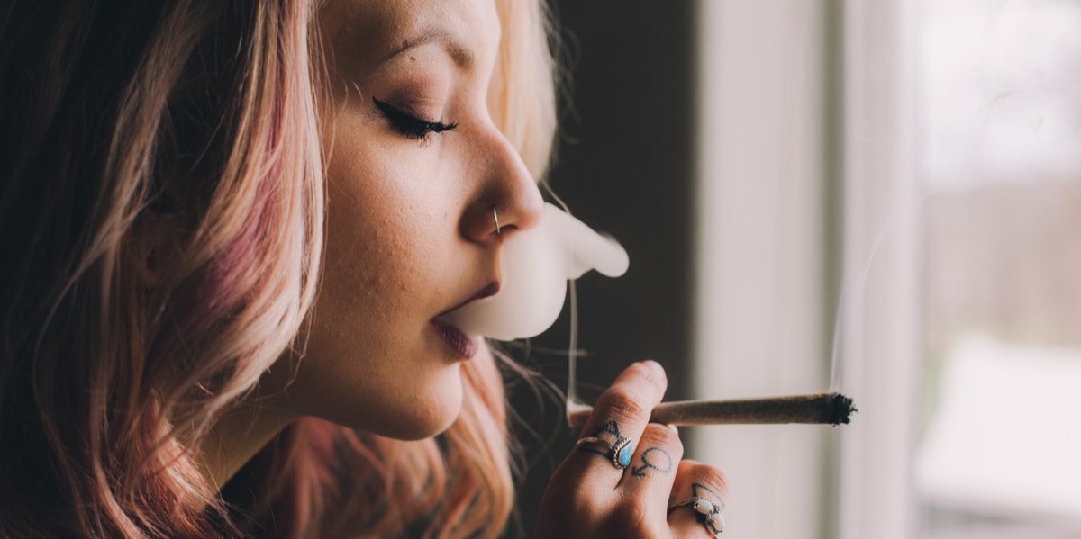 woman smoking marijuana