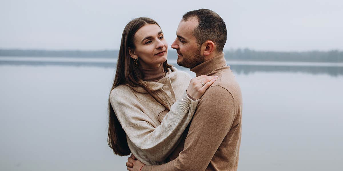 Totally Wrong Myths About What It's Like To Be In A Sexless Marriage couple posing by water