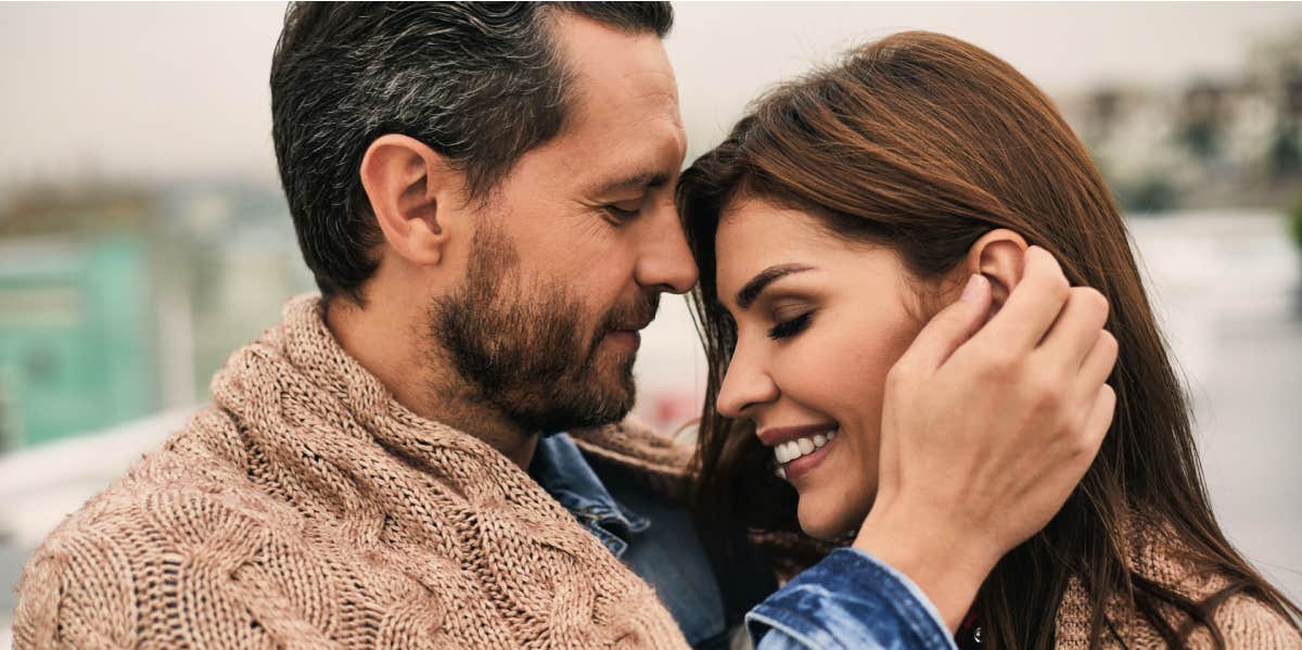 Rare Signs A Wife Is Still Obsessed With Her Husband After Years Of Marriage married couple embracing smiling at each other