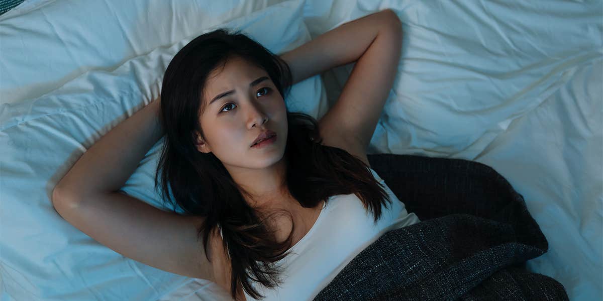 7 Brutal Truths We Wish Everyone Knew About Depression sad woman laying in bed