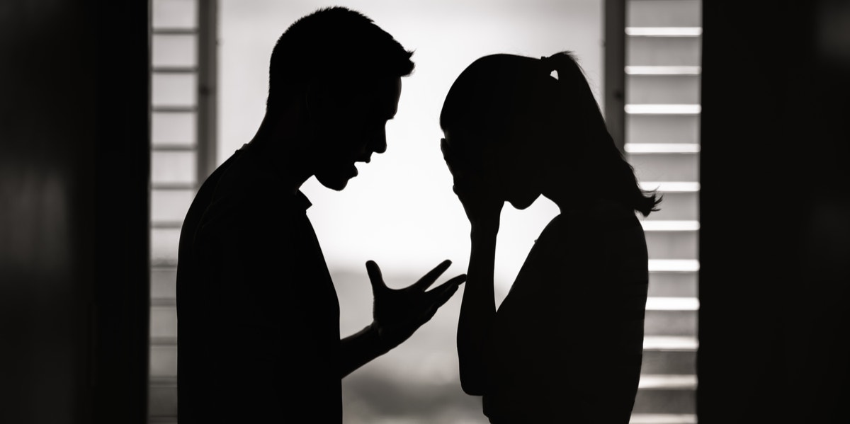 man yelling at woman