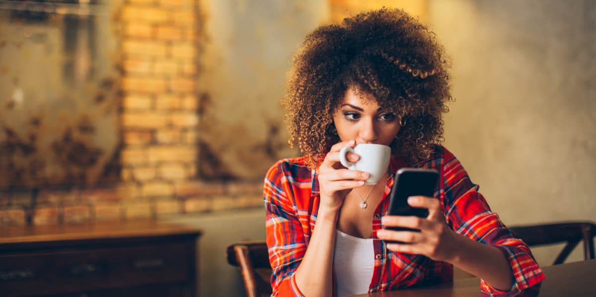 woman checking phone