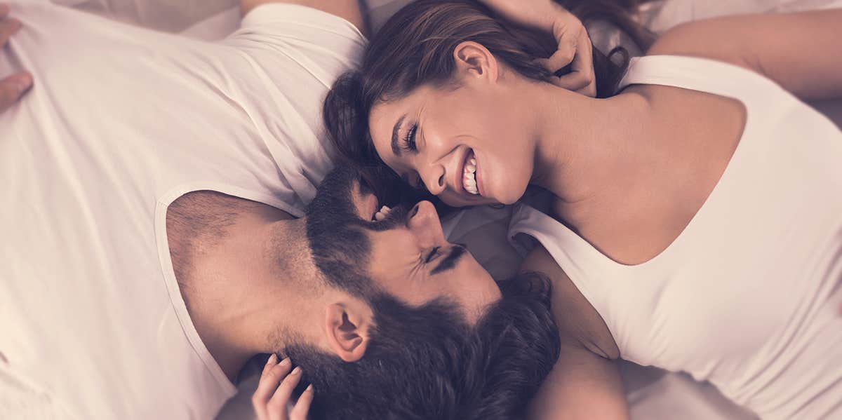 7 Scientific Reasons You Need To Date A Guy With A Beard couple lying in a bed