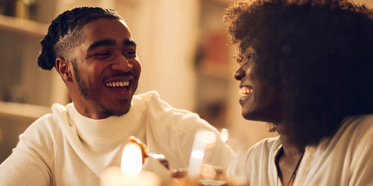 couple eating dinner together talking