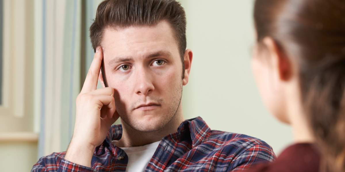 man talking to woman