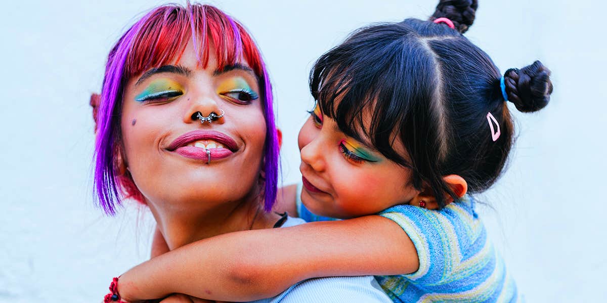 7 Ways Parents Unconsciously Undermine Their Own Children's Well-Bei7 Ways Parents Unconsciously Undermine Their Own Children's Well-Being mom carrying daughter on back