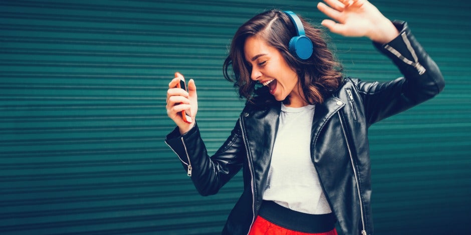 woman dancing to upbeat 70s songs