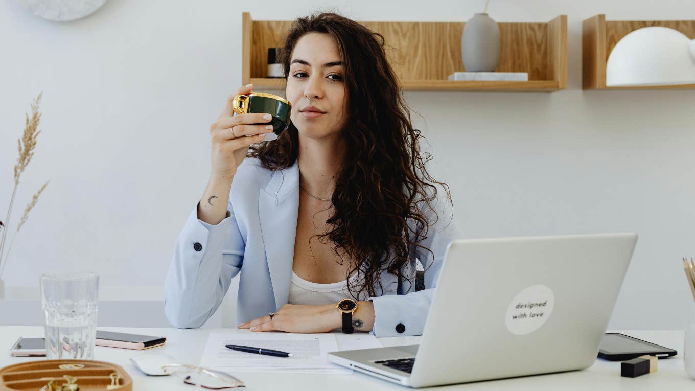 woman sitting at desk with laptop