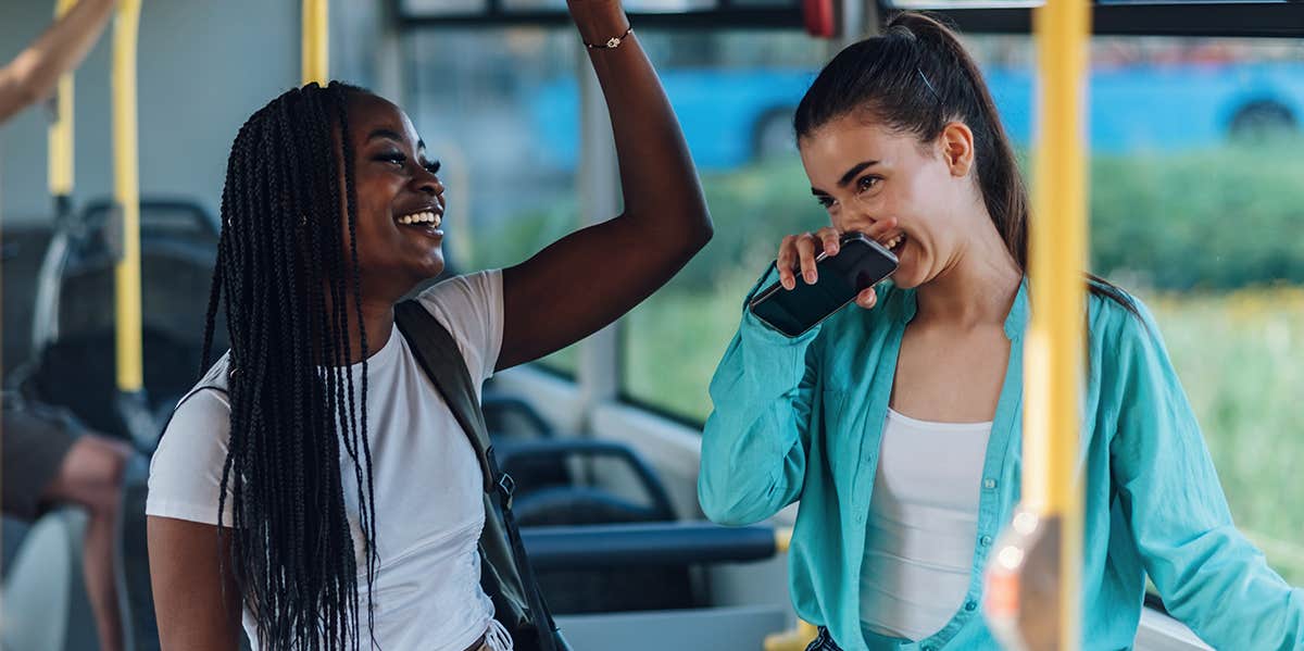 two women talking on buss