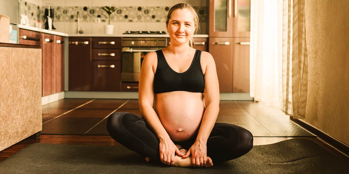 pregnant woman on floor