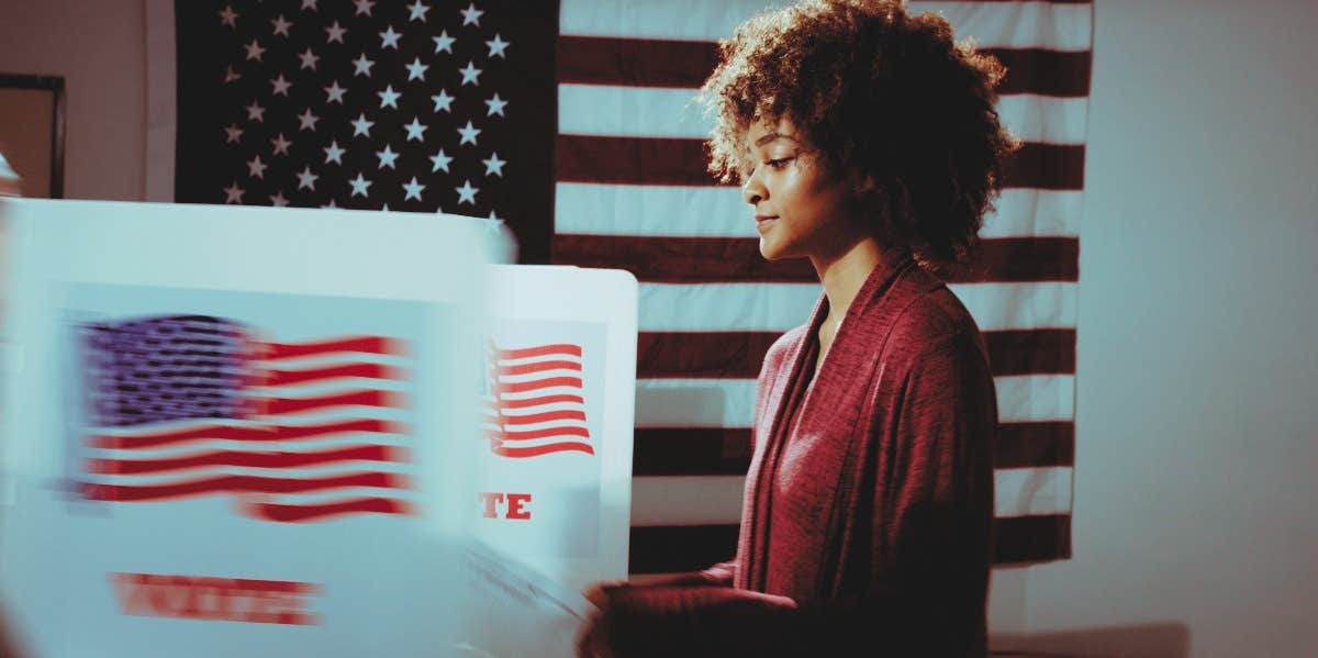 woman at a voting booth