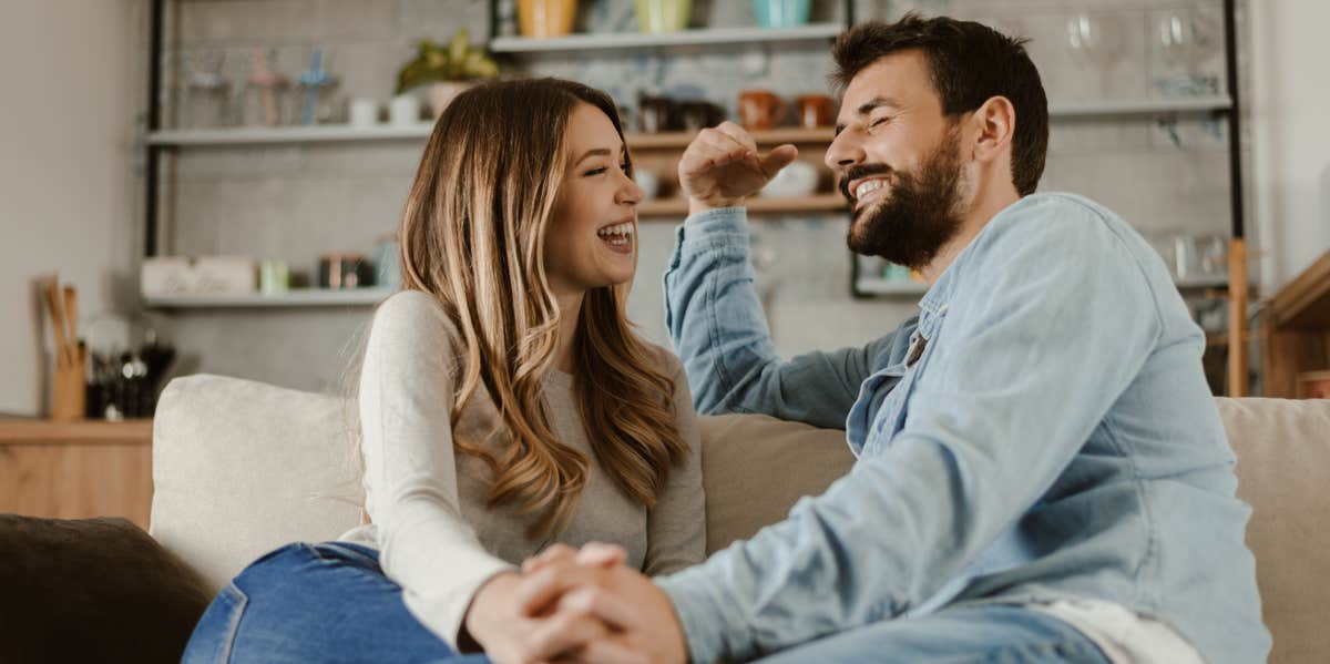 couple talking on couch