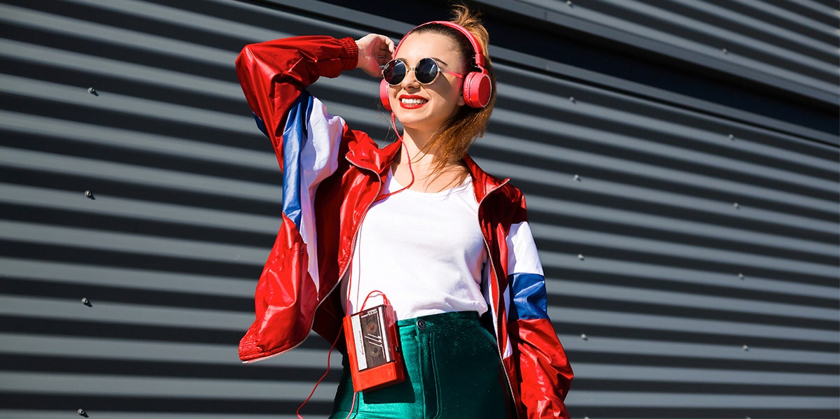 80s girl style listening to music headphones cassette player