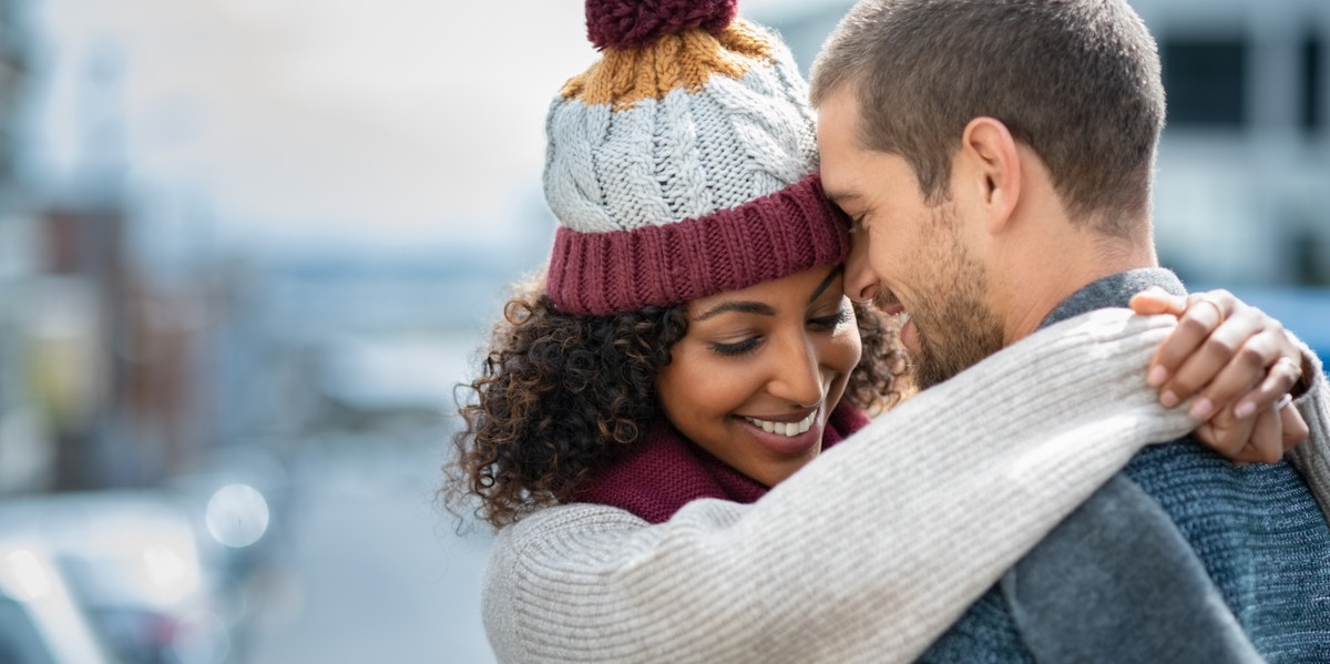 9 Tried-And-True Signs You're In A Genuinely Healthy Relationship man and woman hugging