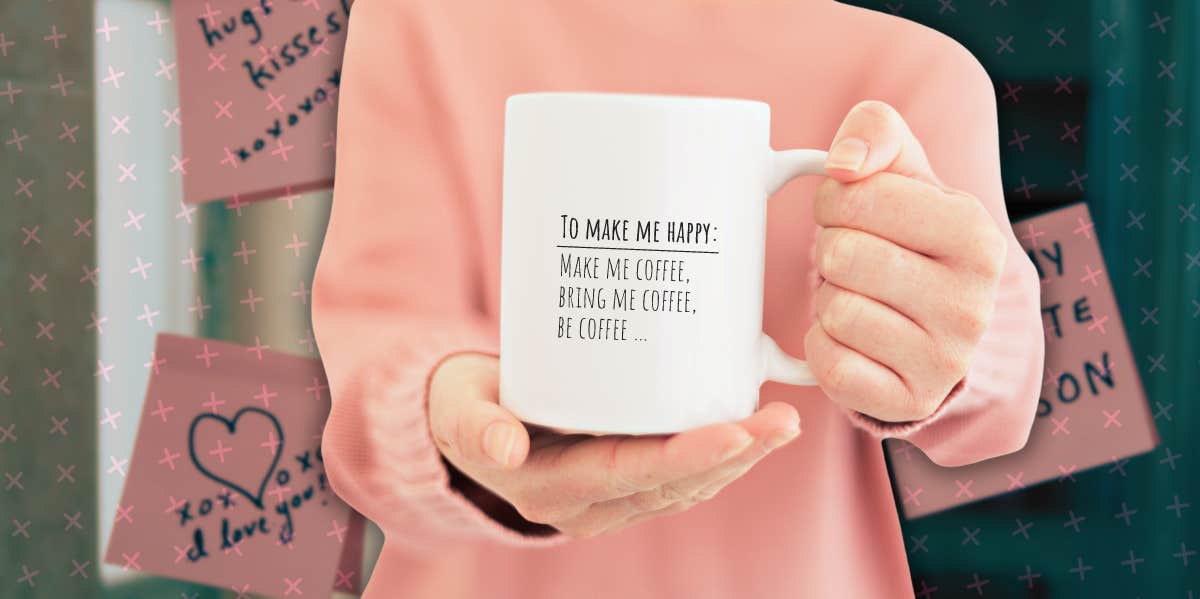 woman presents mug of coffee standing in front of mirror with love notes stuck to it