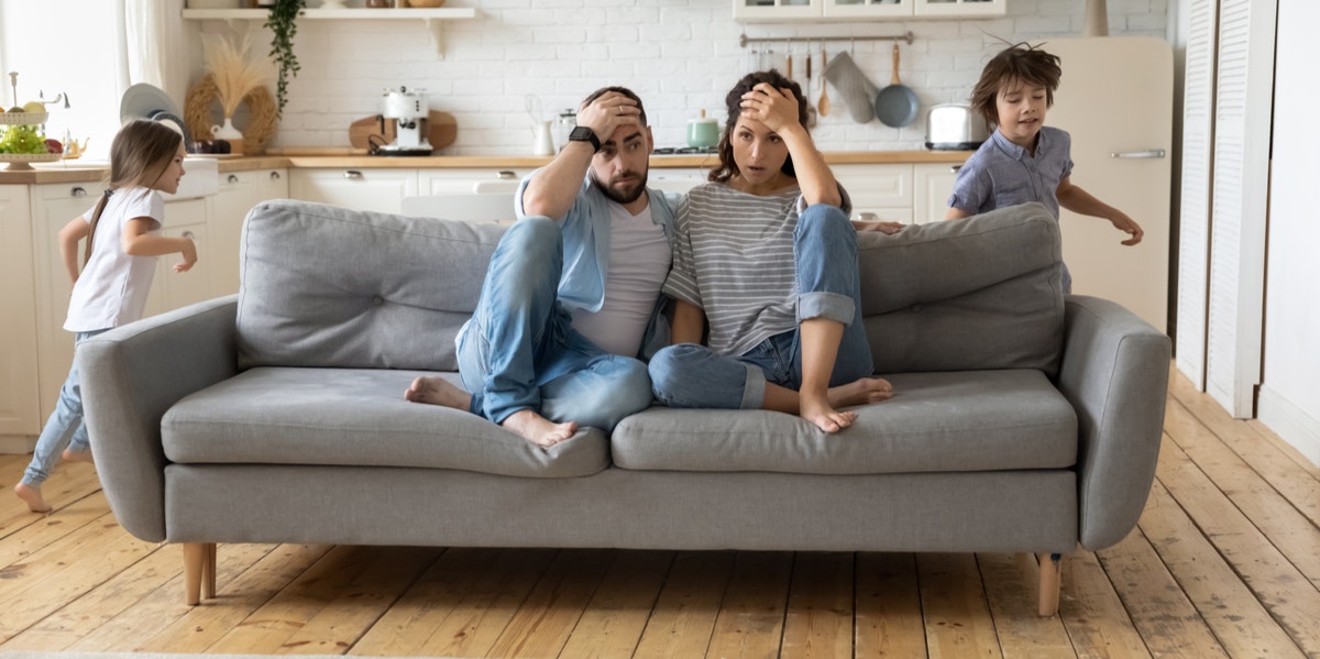 parents and kids on couch