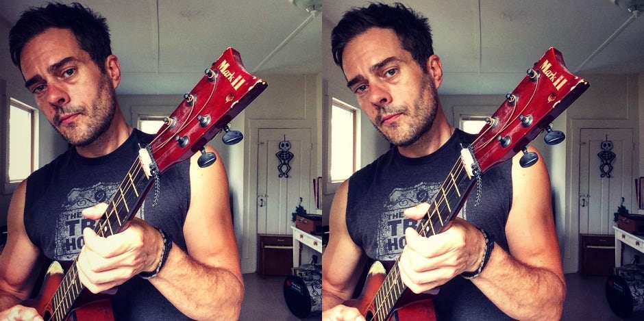 husband holding a guitar what your wife wants from her husband