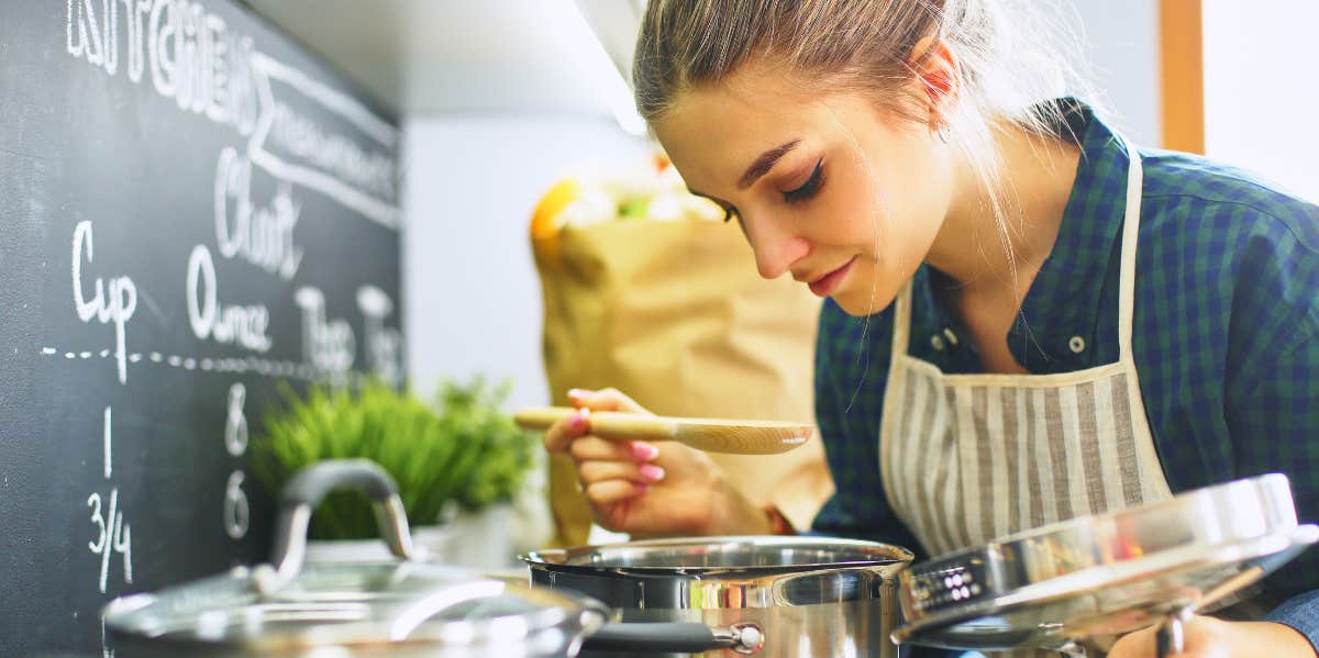 Man Refuses To Let His Kids Eat The Meal Their Mom Prepared woman cooking in kitchen