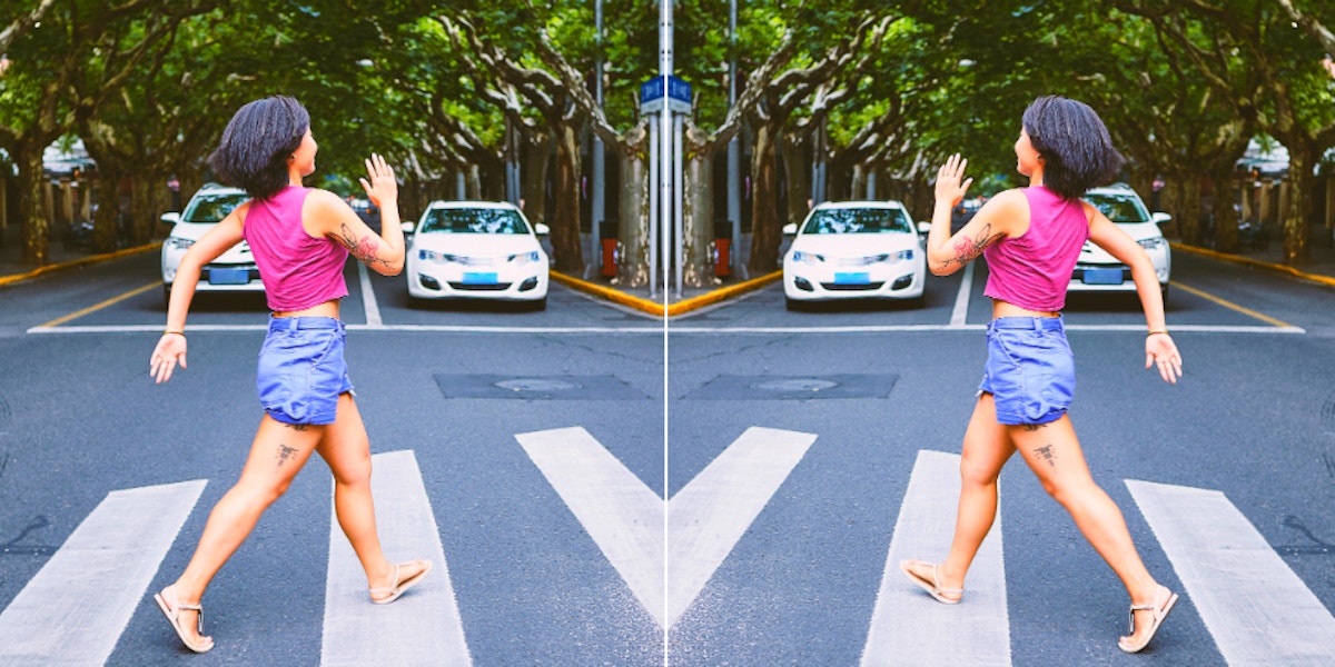 woman running across the street