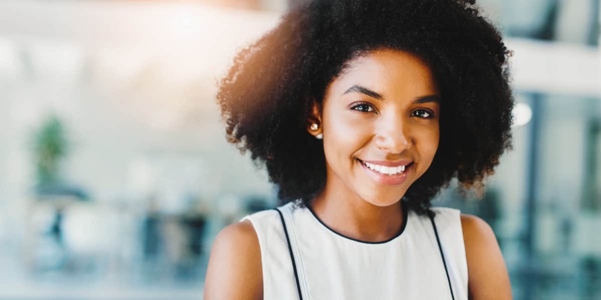 Black woman smiling at work`