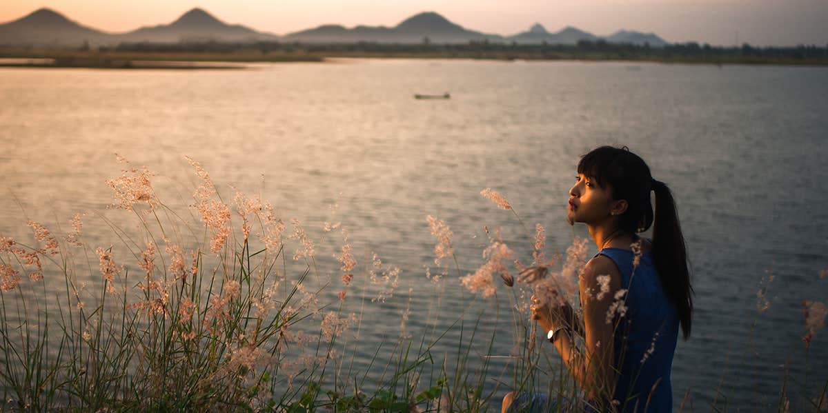 A Year From Now, You’ll Be Grateful That You Got Your Life Back woman standing by lake
