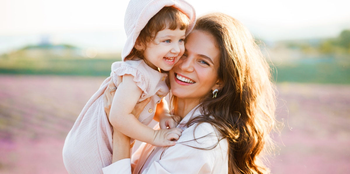 woman holding child