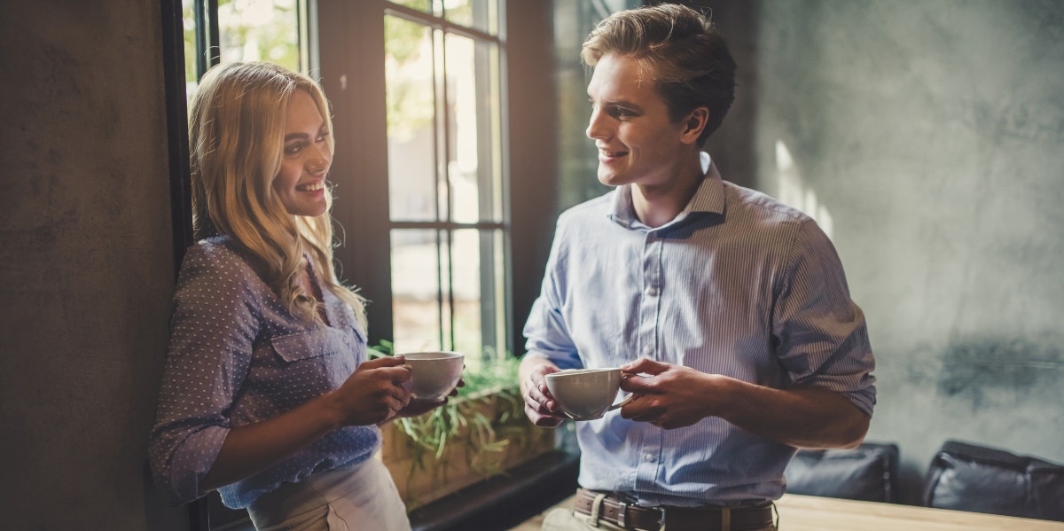 man and woman talking