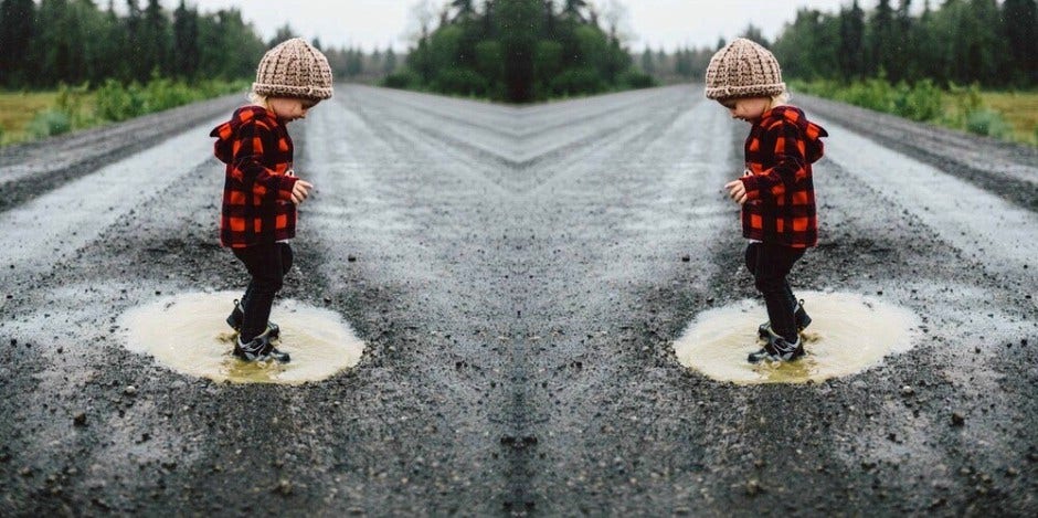 kid in puddle kid in puddle